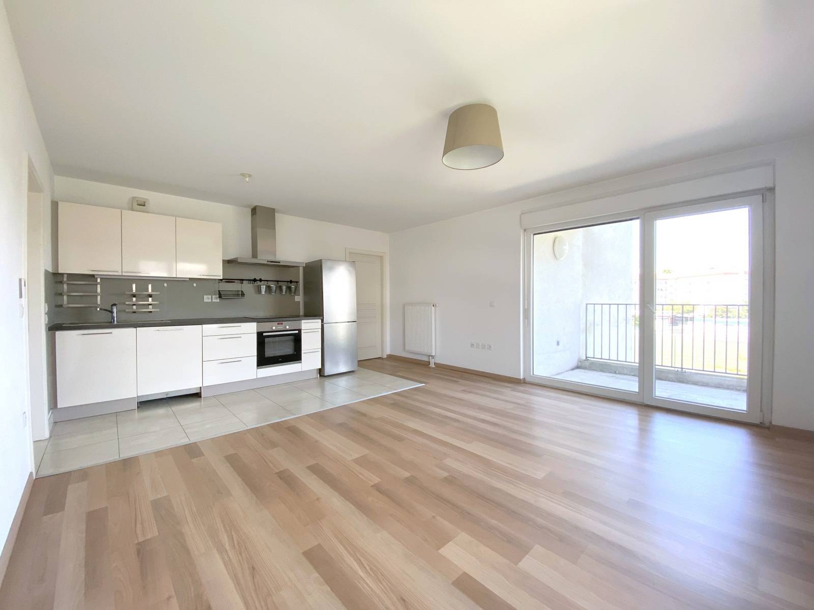 VENDU - Neudorf dans immeuble bbc - appartement 4 pieces avec terrasse et parking dans un ilot de verdure